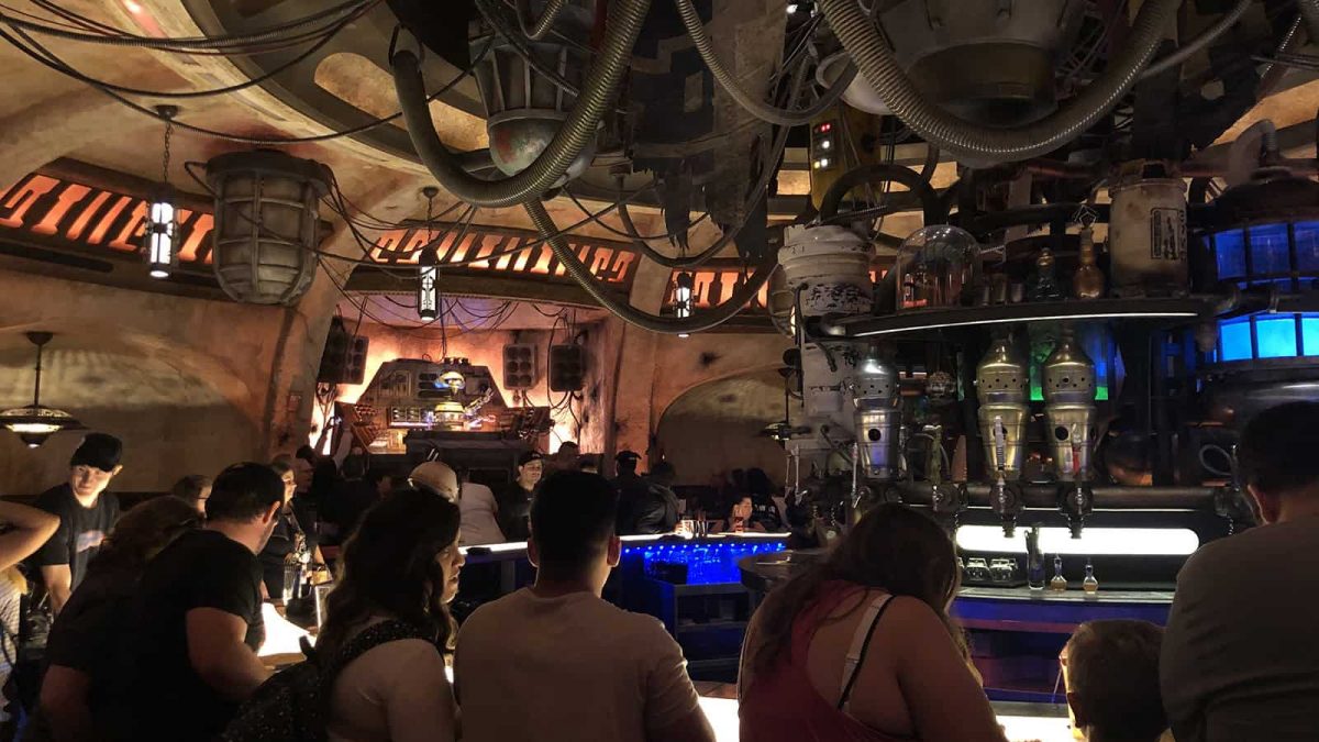 Interior photo of Oga's Cantina showing patrons sitting at the bar