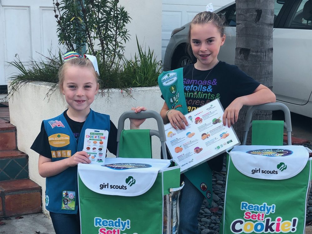 Sisters selling cookies