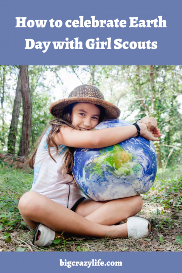 Girl holding earth ball