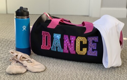 Dance bag with shoes and a water bottle